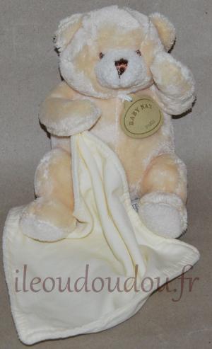 Doudou ours jaune tenant un mouchoir blanc Baby Nat