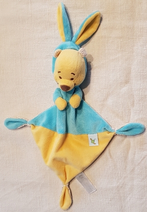 Doudou Winnie ours plat bleu turquoise et jaune, capuche, oreilles de lapin Nicotoy, Disney Baby, Simba Toys (Dickie)