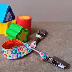 Attache-doudou pois fluo multicolores