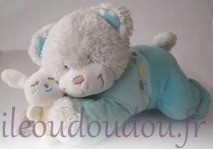 Ours blanc et bleu turquoise peluche musicale Tex Baby