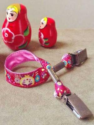 Attache doudou Poupée russes doublé de satin rose Polkadot