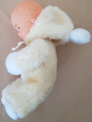 Peluche poupon jaune capuche