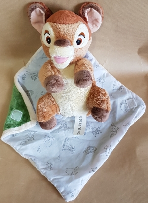 Peluche Bambi dans sa couverture